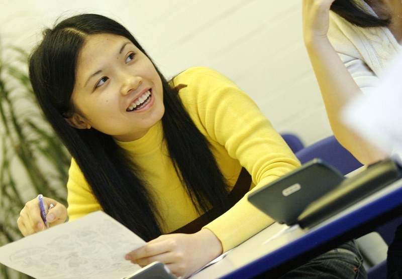 student smiling in class 0x0